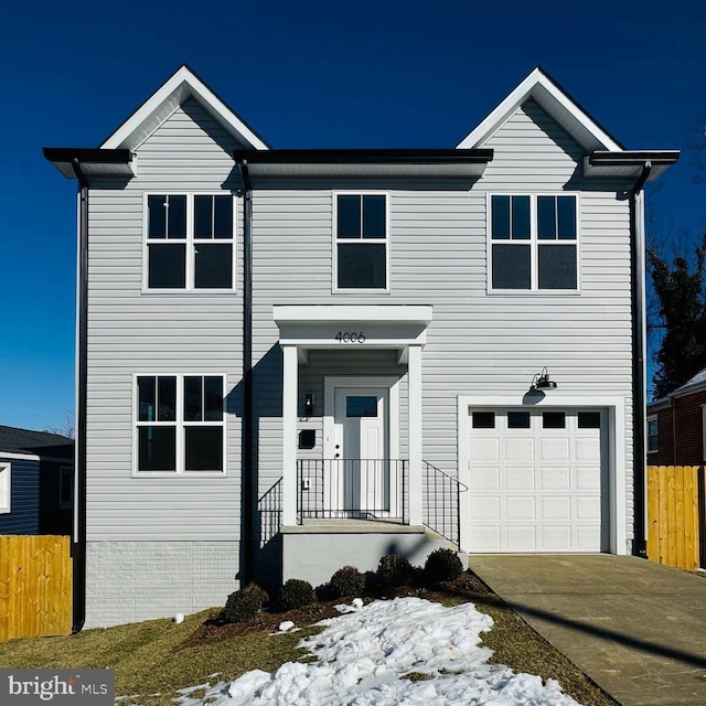 view of front of property featuring a garage