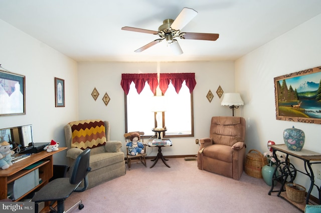 office featuring carpet flooring and ceiling fan