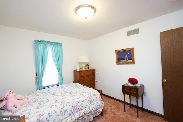 bedroom featuring carpet