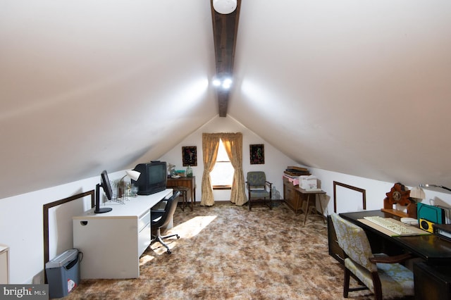 carpeted office with lofted ceiling with beams