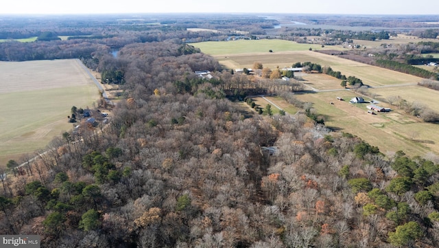 birds eye view of property with a rural view