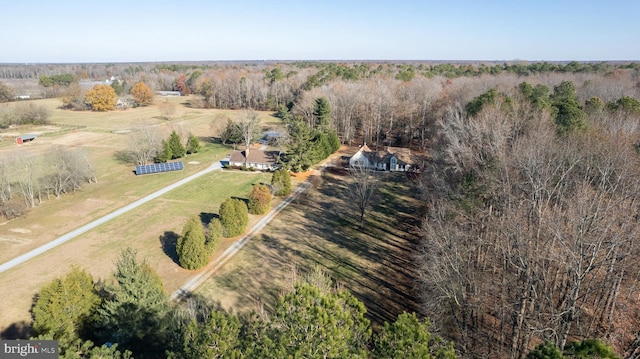 birds eye view of property with a rural view