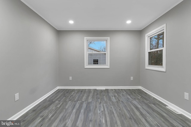 unfurnished room featuring dark hardwood / wood-style floors