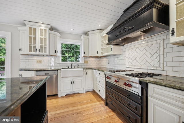 1523 Johnnys Way, West Chester, PA 19382 - kitchen with appliances with stainless steel finishes, a sink, premium range hood, healthy amount of natural light, and wooden ceiling