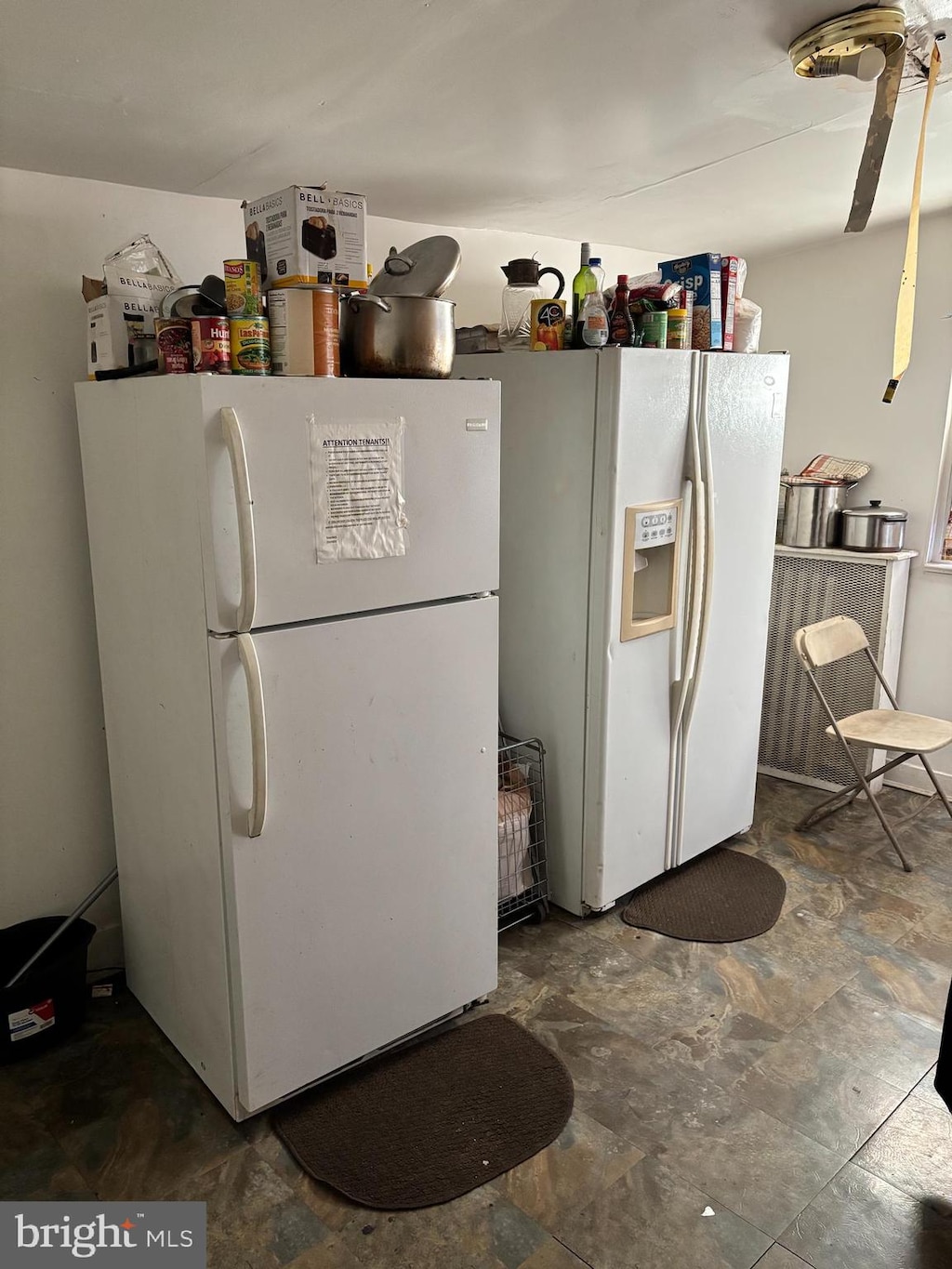 kitchen with white fridge and white refrigerator with ice dispenser