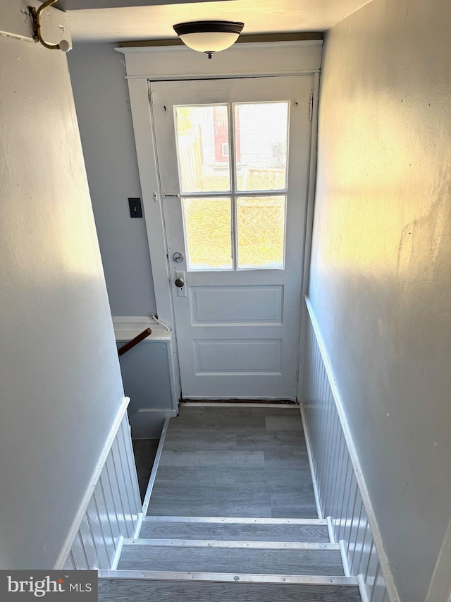 doorway with wood finished floors