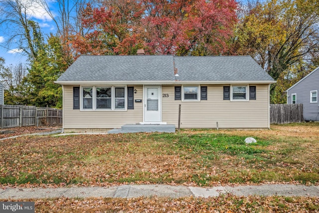 view of front of property with a front lawn