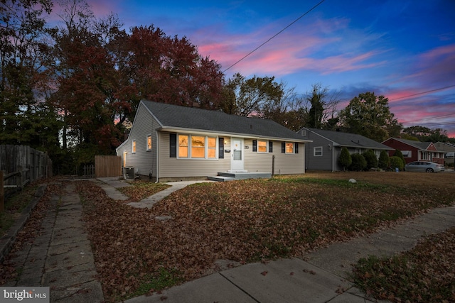 ranch-style house featuring central AC unit