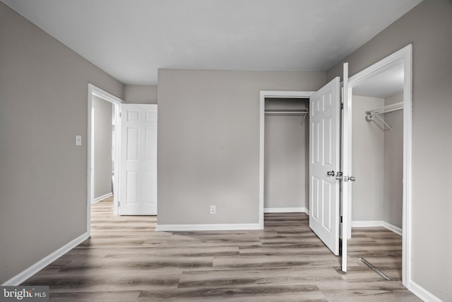 unfurnished bedroom featuring light hardwood / wood-style floors