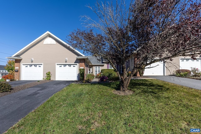 ranch-style house with a front lawn and a garage