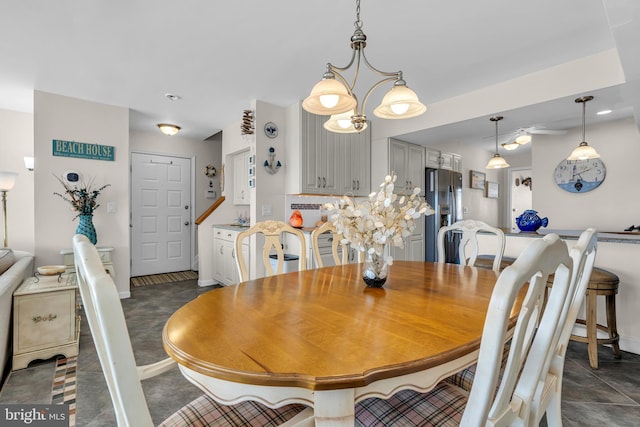 dining room featuring a chandelier