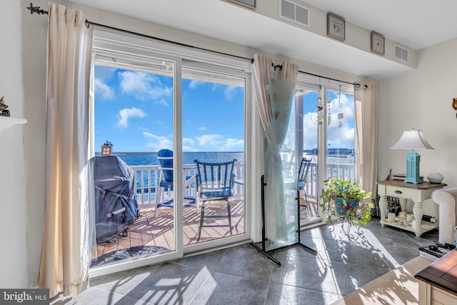 doorway featuring a water view