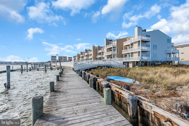 view of dock with a water view