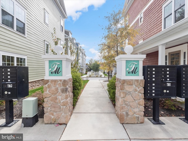 view of home's community with a mail area