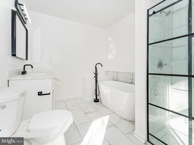 2592 Druid Park Dr, Baltimore, MD 21215 - bathroom featuring marble finish flooring, toilet, a stall shower, a freestanding tub, and vanity