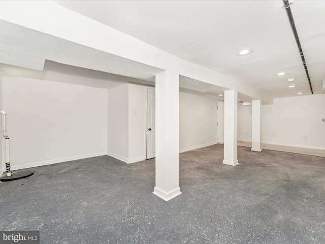 2592 Druid Park Dr, Baltimore, MD 21215 - finished below grade area with baseboards, recessed lighting, and drainage system