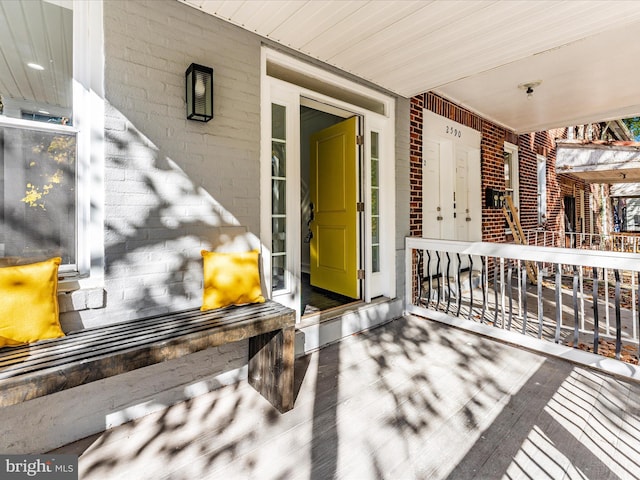2592 Druid Park Dr, Baltimore, MD 21215 - doorway to property featuring a porch