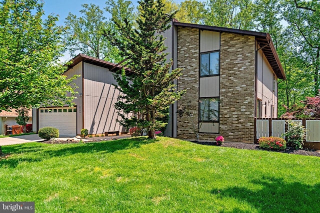 9103 Home Guard Dr, Burke, VA 22015 - mid-century home featuring a garage, brick siding, and concrete driveway