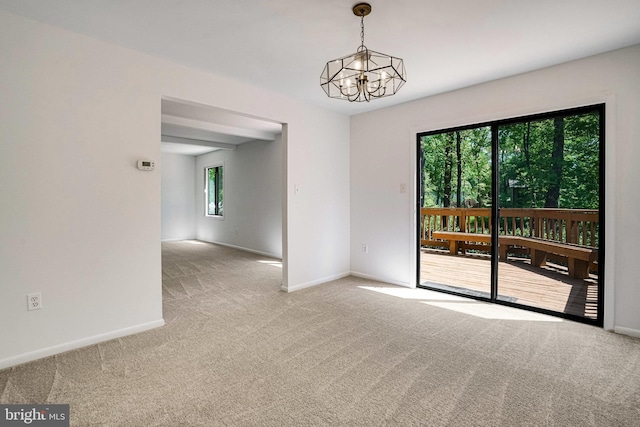 9103 Home Guard Dr, Burke, VA 22015 - empty room featuring carpet flooring, baseboards, and a chandelier