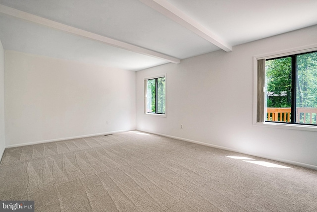 9103 Home Guard Dr, Burke, VA 22015 - carpeted spare room with beam ceiling, plenty of natural light, and baseboards