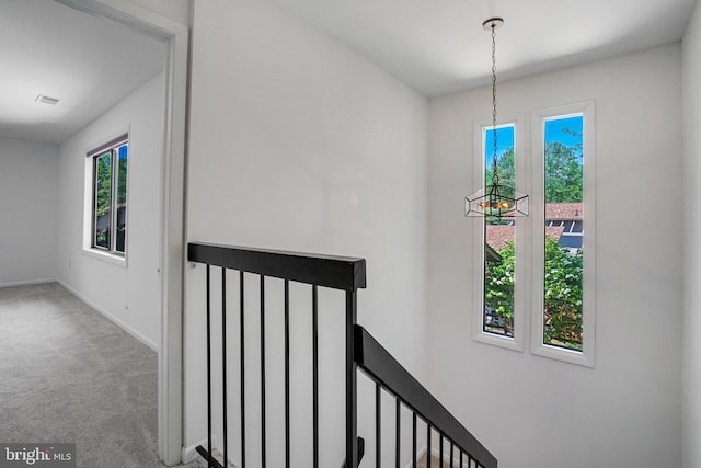 9103 Home Guard Dr, Burke, VA 22015 - hall with carpet flooring, baseboards, and an upstairs landing