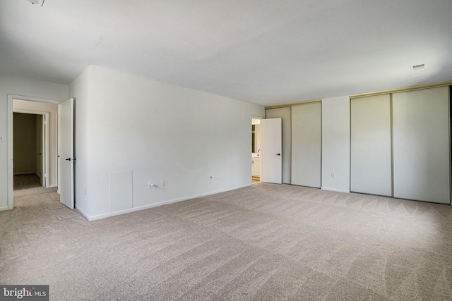 9103 Home Guard Dr, Burke, VA 22015 - unfurnished bedroom with carpet, two closets, and baseboards