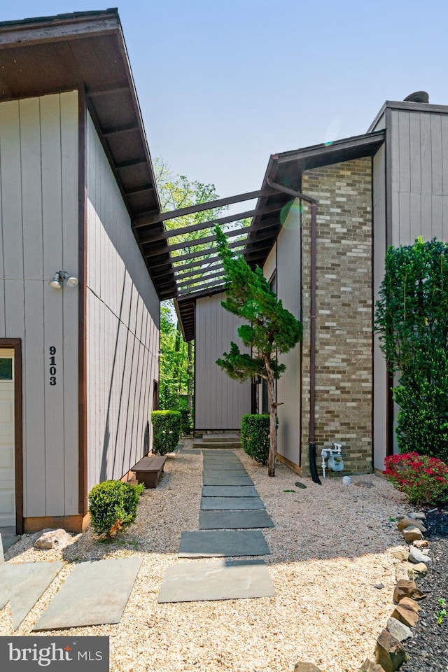 9103 Home Guard Dr, Burke, VA 22015 - property entrance with brick siding