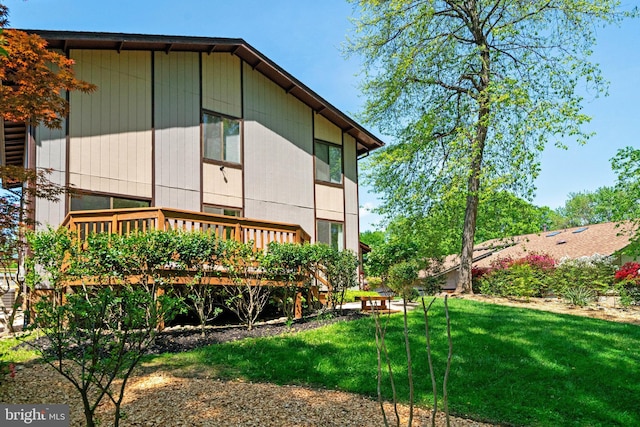9103 Home Guard Dr, Burke, VA 22015 - view of home's exterior featuring a deck and a yard