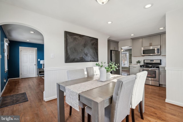 dining room with hardwood / wood-style flooring