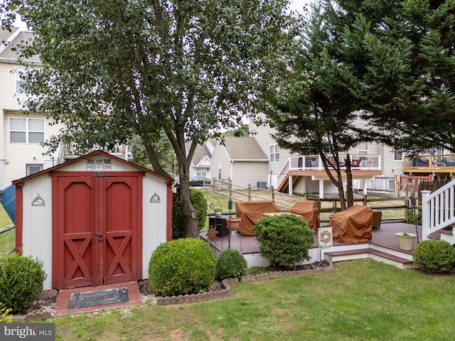 view of outbuilding with a yard