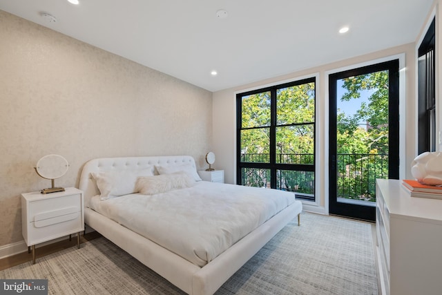 bedroom with light hardwood / wood-style floors