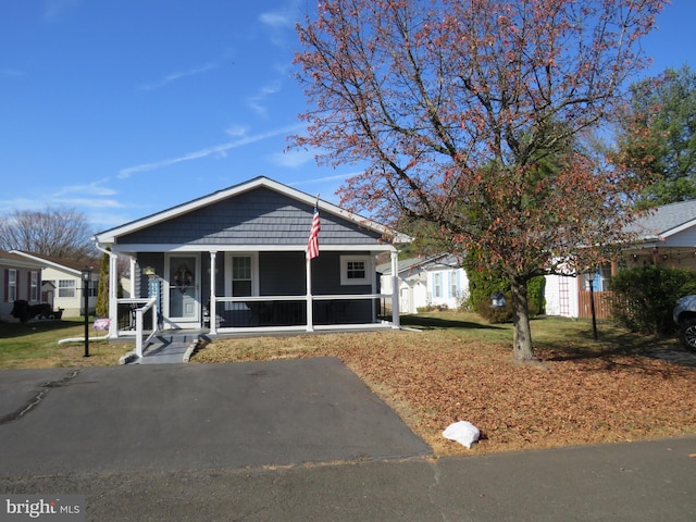 bungalow-style home featuring covered porch