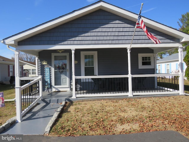 bungalow-style home with a porch