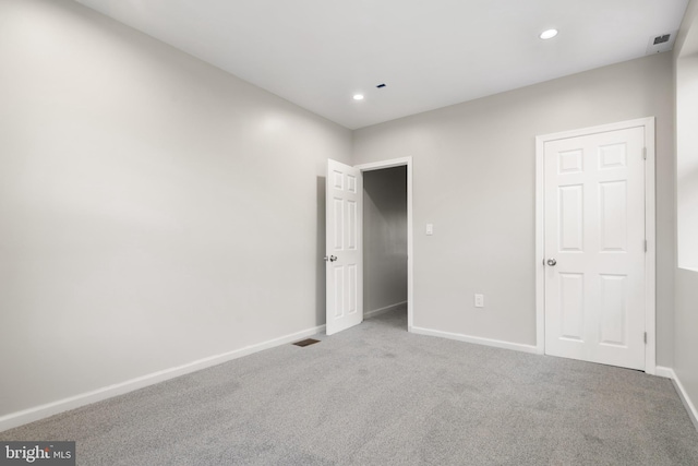 unfurnished bedroom featuring carpet flooring