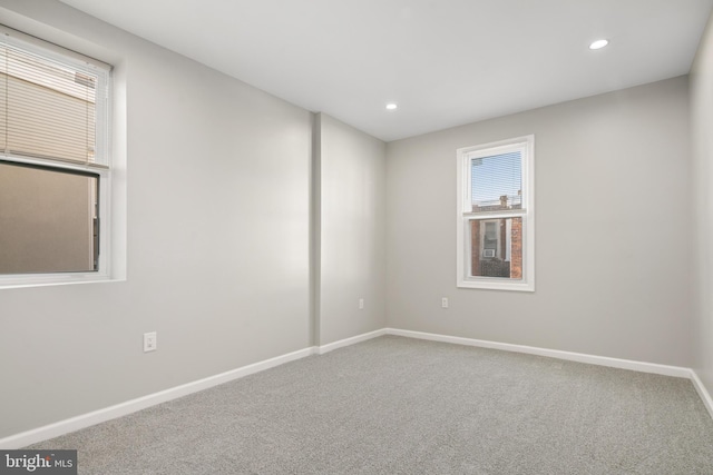 unfurnished room with carpet