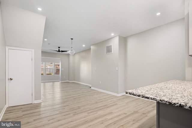 interior space featuring ceiling fan and light hardwood / wood-style floors