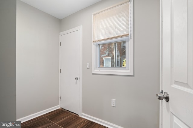 doorway featuring dark hardwood / wood-style floors