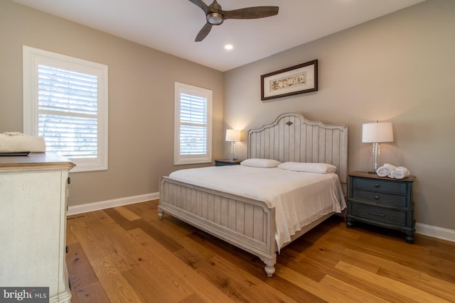 bedroom featuring ceiling fan and light wood-type flooring