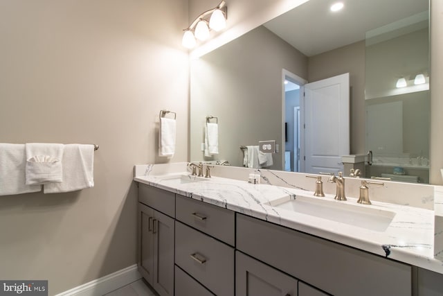 bathroom with vanity and tile patterned floors