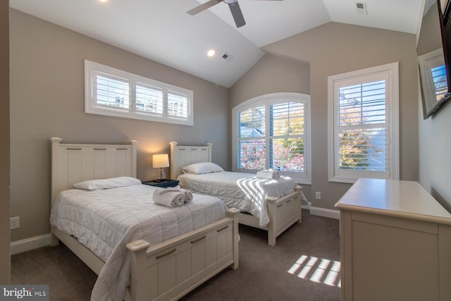 carpeted bedroom featuring lofted ceiling and ceiling fan