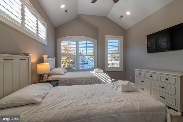 bedroom with ceiling fan and vaulted ceiling