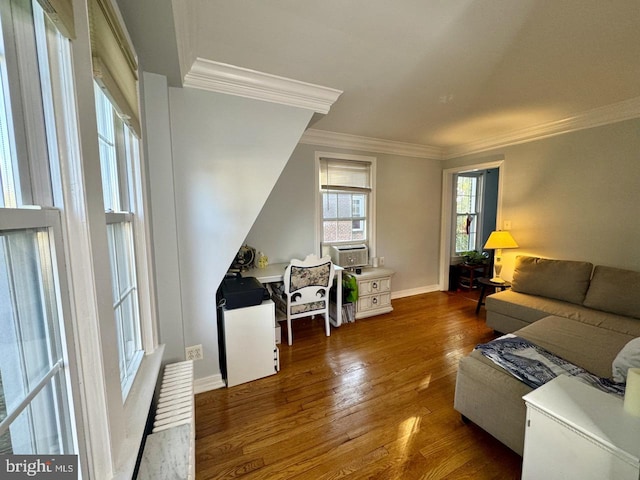 living room featuring dark wood-type flooring, cooling unit, and crown molding