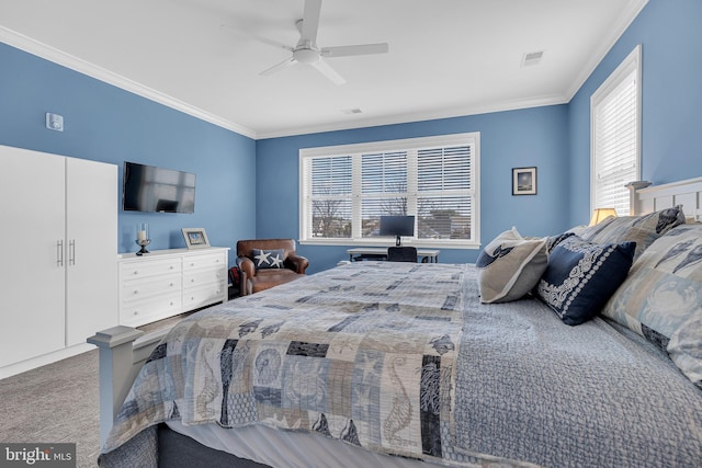 bedroom with ceiling fan, carpet flooring, and ornamental molding