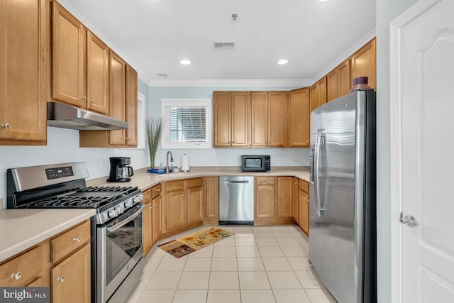 kitchen with light tile patterned flooring, sink, appliances with stainless steel finishes, and ornamental molding