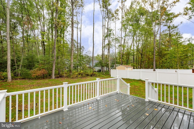 deck featuring a lawn