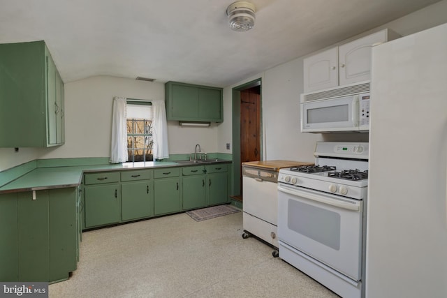 kitchen featuring white cabinets, green cabinets, sink, and white appliances