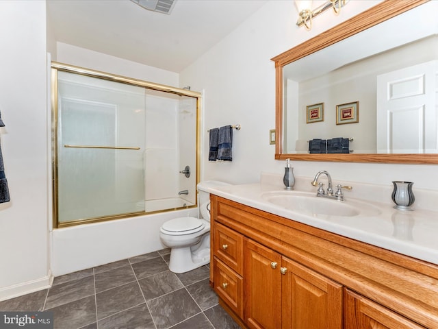 full bathroom with shower / bath combination with glass door, vanity, and toilet