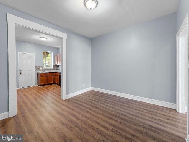 unfurnished room featuring hardwood / wood-style floors