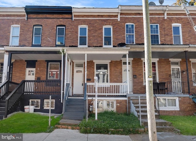 multi unit property featuring a porch