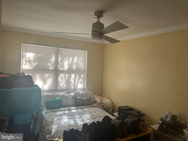 bedroom with crown molding and a ceiling fan
